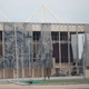 Tapices del artista local Adriano Varejão, hechos jirones en la fachada del estadio para pruebas de agua. Foto: AP